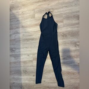 Woman’s  under armor heat gear Black One Piece Catsuit size Medium